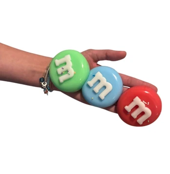 SQUISHY letenėlės serijos žaislas M&M