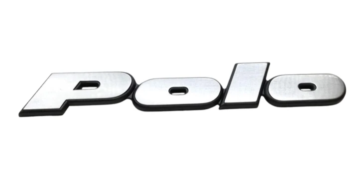 VAG VW emblema Polo 867853687KGX2 Originali