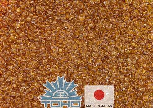 TOHO® Biseris Transparent Honey 11/0 (2,2 mm) 10 g.