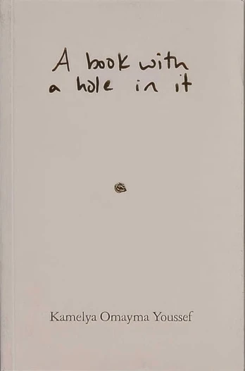 book with a hole in it