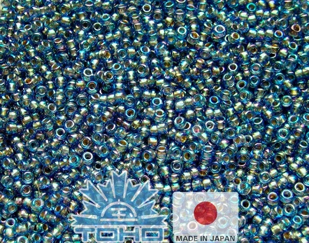 TOHO® Biseris Gold-Lined Rainbow Lt Sapphire 11/0 (2,2 mm) 10 g.
