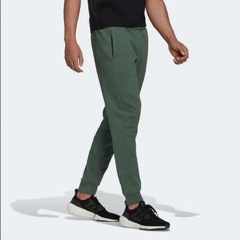 Sportinės kelnės vyrams Adidas, žalios