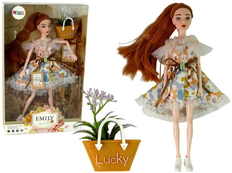 Lėlė Emily su gėlėmis rankinėje