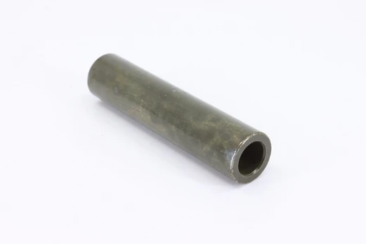 9060-060201-00002 SPACER, REAR LOWER SWING ARM