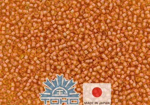 TOHO® Biseris Inside-Color Lt Topaz/Peach-Lined 11/0 (2,2 mm) 10 g.