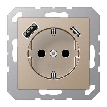 JUNG Lizdas SCHUKO su USB A ir USB C 3A šampano spalvos 16A 250V (A serija)