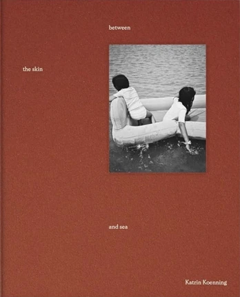 between the skin and sea