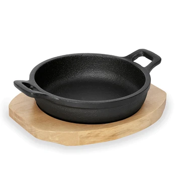 Keptuvėlė Ø16 cm. Ketaus su medžio padu.