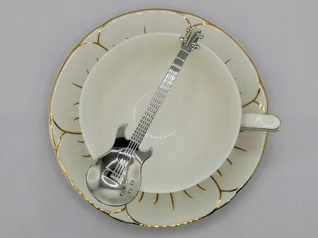 Cukraus šaukštelis gitara